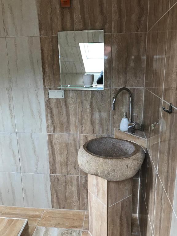 Kúpeľňa v ubytovaní Dom Gościnny Mirabelka