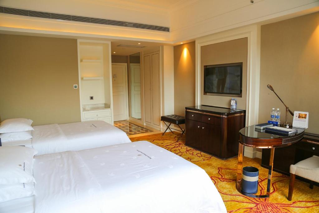 TV a/nebo společenská místnost v ubytování Shenzhen Dayhello international Hotel (Baoan)