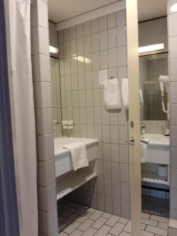 Koupelna v ubytování City Hotel Nattergalen