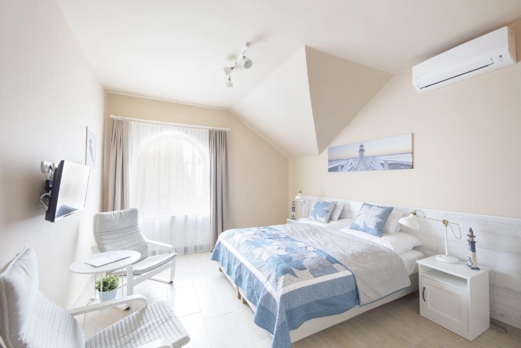 Posteľ alebo postele v izbe v ubytovaní TópART Apartman I