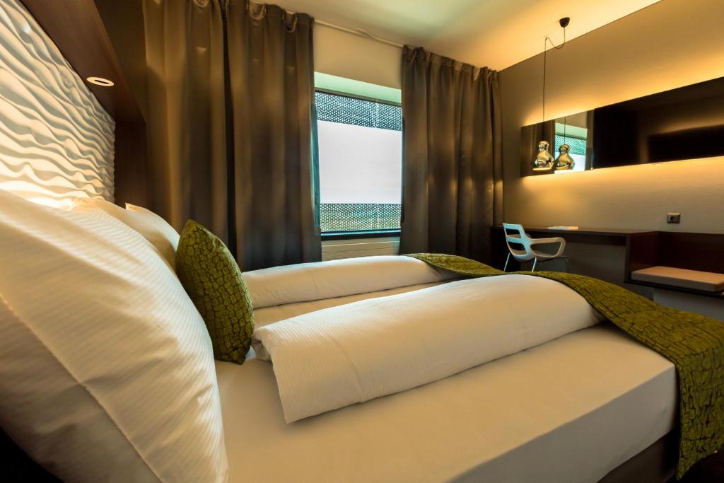 Posezení v ubytování Airport Hotel Basel - Convenient & Friendly