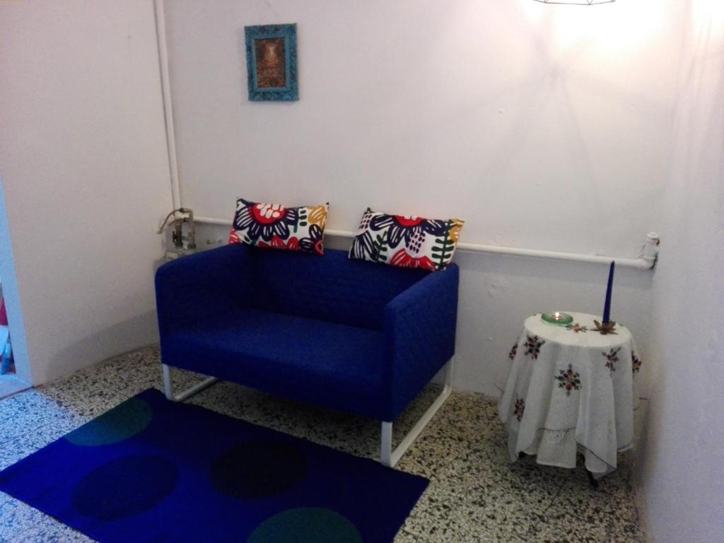 A seating area at mansarda pieno centro