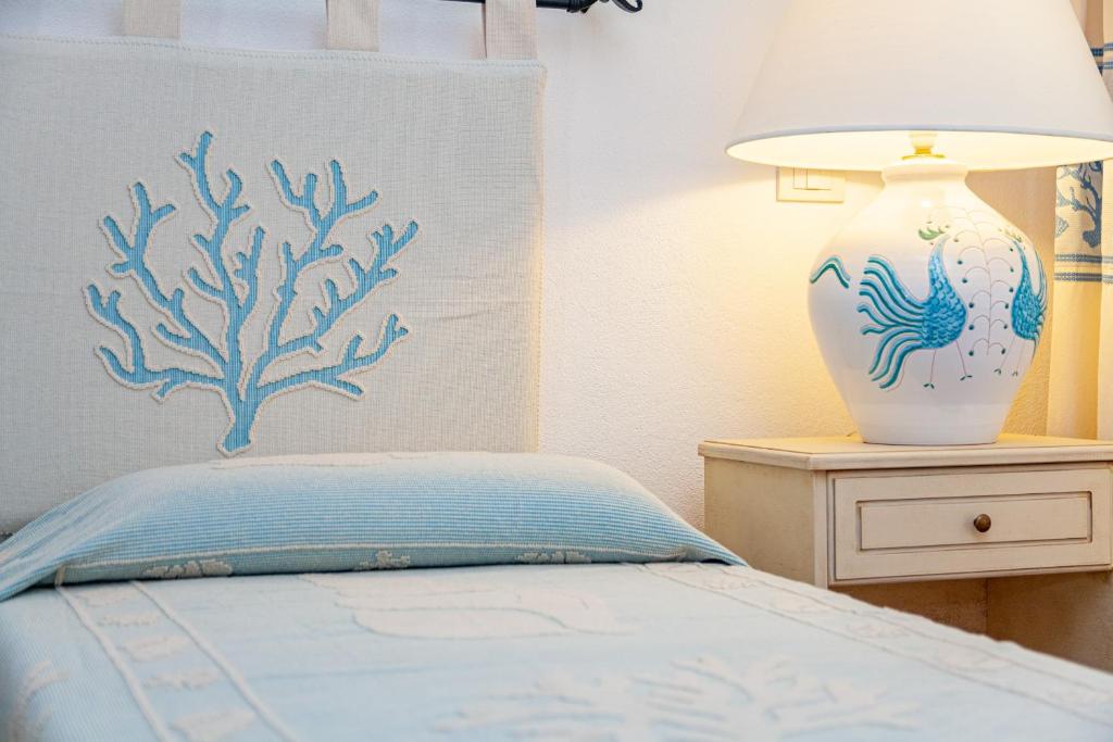 Postel nebo postele na pokoji v ubytování Hotel San Trano