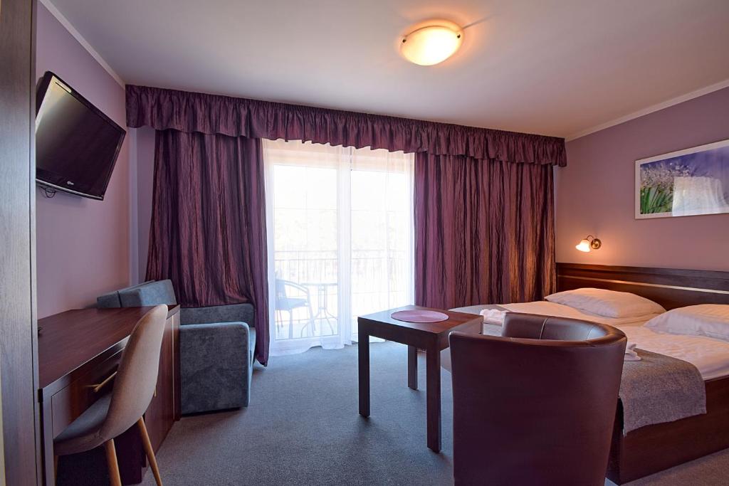Posteľ alebo postele v izbe v ubytovaní Lazur Wellness@Spa