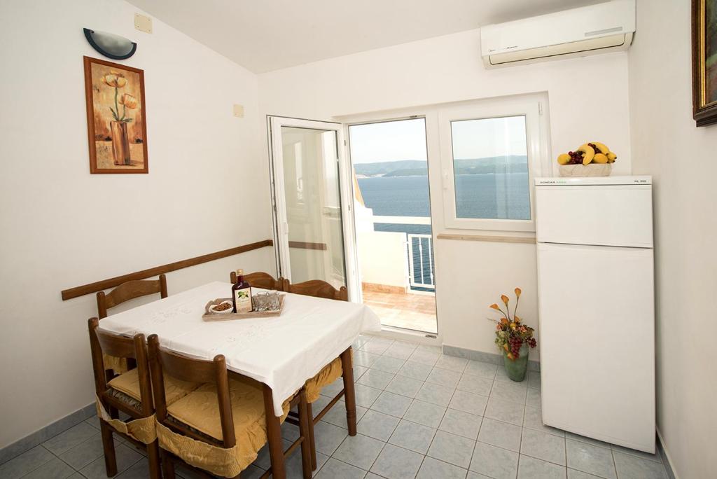 Kuchyň nebo kuchyňský kout v ubytování Apartments Drago Kovačić