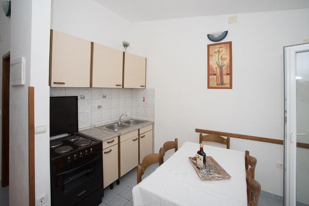 Kuchyň nebo kuchyňský kout v ubytování Apartments Drago Kovačić
