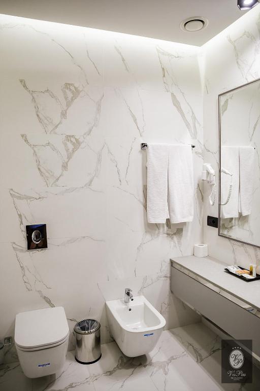 Koupelna v ubytování VisPas Hotel