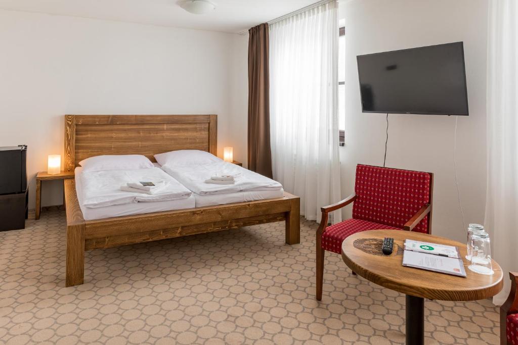 Postel nebo postele na pokoji v ubytování Luční bouda