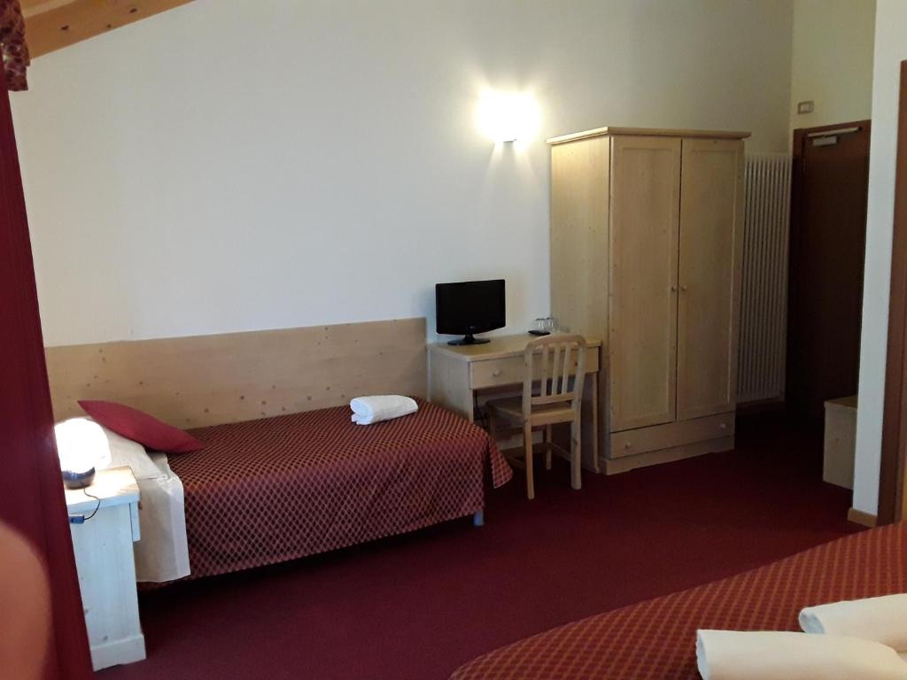 Postel nebo postele na pokoji v ubytování Hotel Bellaria