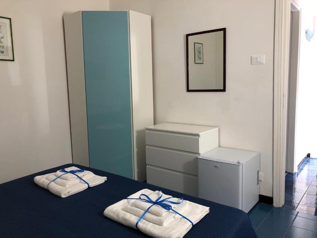 Postel nebo postele na pokoji v ubytování Villa Azzurra