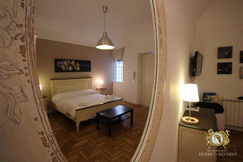 Posteľ alebo postele v izbe v ubytovaní Federico Secondo B&B