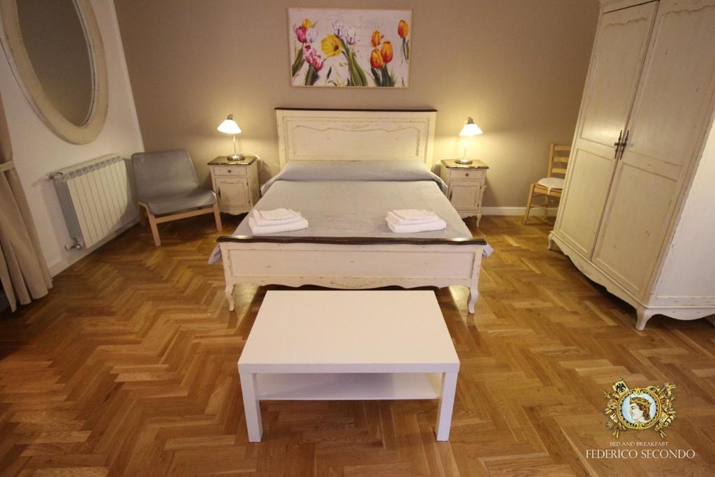 Posteľ alebo postele v izbe v ubytovaní Federico Secondo B&B