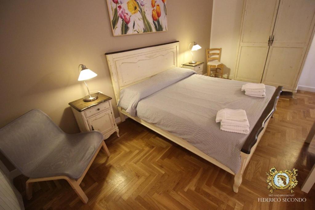 Posteľ alebo postele v izbe v ubytovaní Federico Secondo B&B