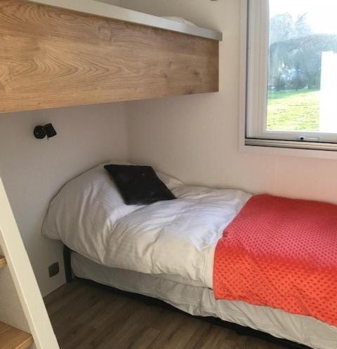 Postel nebo postele na pokoji v ubytování Camping Ty Nénez