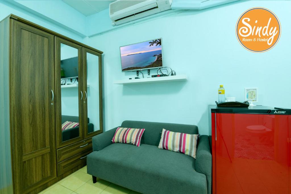TV a/nebo společenská místnost v ubytování Sindy's Hostel