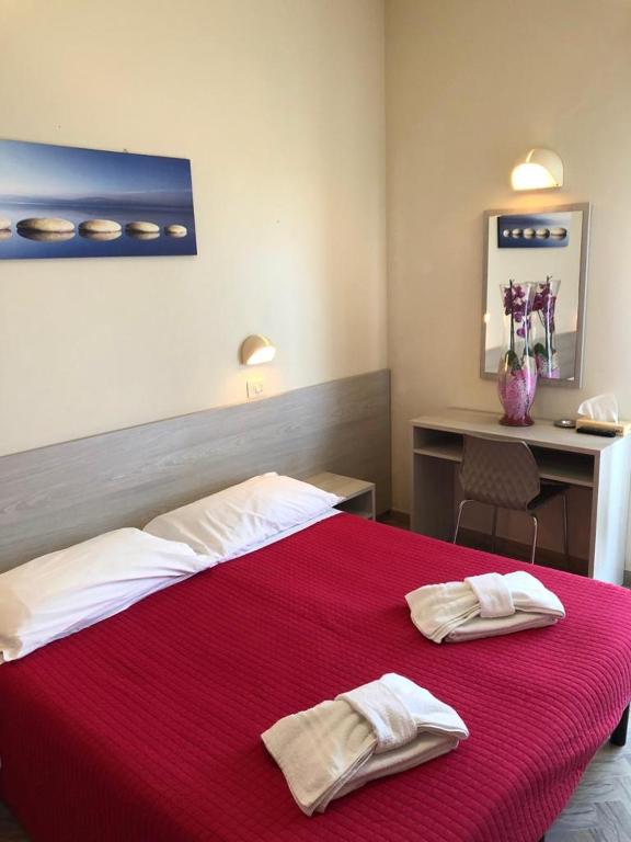 Postel nebo postele na pokoji v ubytování Hotel Lem