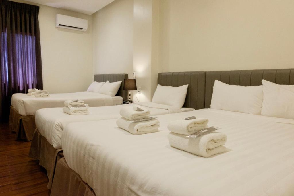Postel nebo postele na pokoji v ubytování CREVICE HOTEL