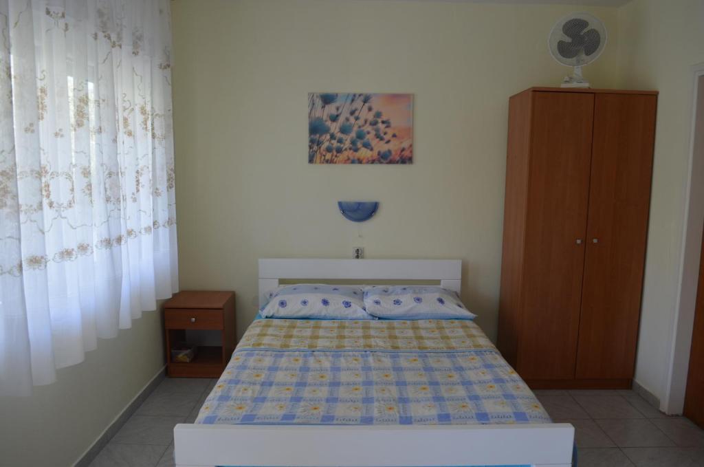 Postel nebo postele na pokoji v ubytování Apartments Alen