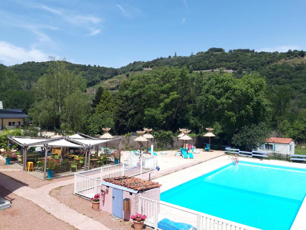 a view of a swimming pool at a resort at La Bohème in Tournon-sur-Rhône