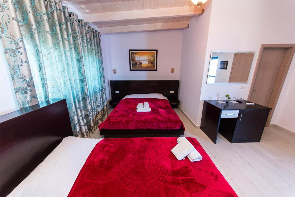 Postel nebo postele na pokoji v ubytování Hotel Bahamas
