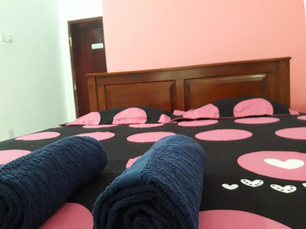 Postel nebo postele na pokoji v ubytování White Wall Hotel
