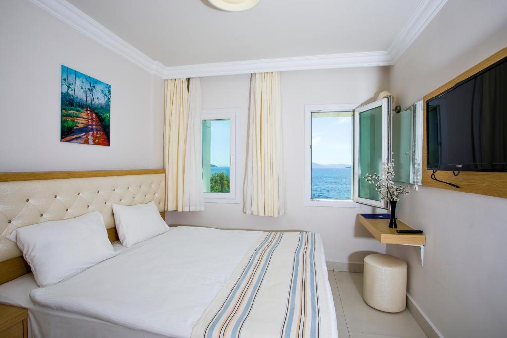 Postel nebo postele na pokoji v ubytování Dragut Point North Hotel - All Inclusive