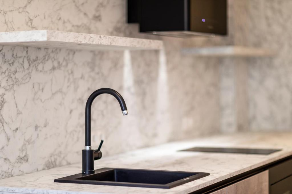 A kitchen or kitchenette at Stay COOPER l Cooper apartments