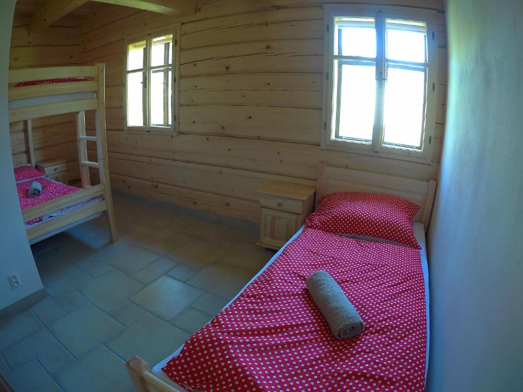 Postel nebo postele na pokoji v ubytování Roubenka Pod Čapím vrchem