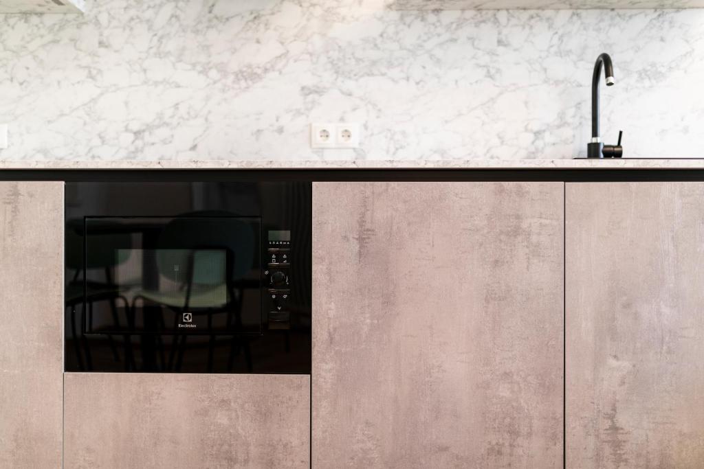 A kitchen or kitchenette at Stay COOPER l Cooper apartments
