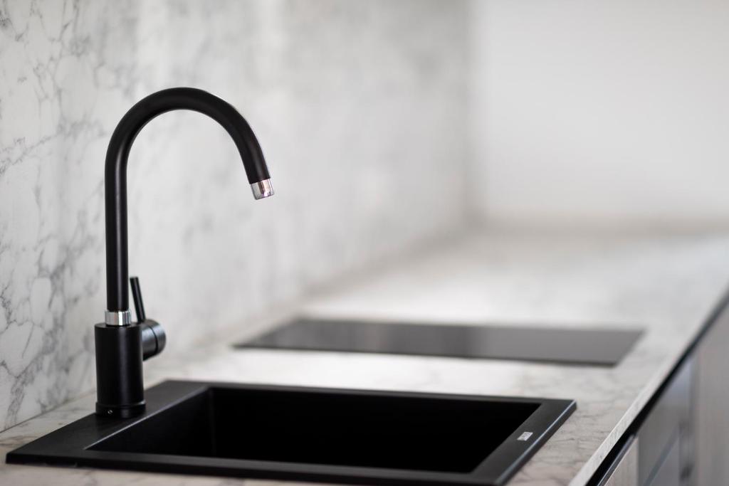A kitchen or kitchenette at Stay COOPER l Cooper apartments