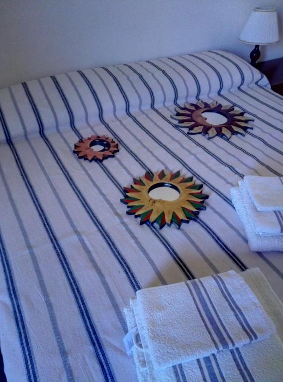 Postel nebo postele na pokoji v ubytování Rosy B&B