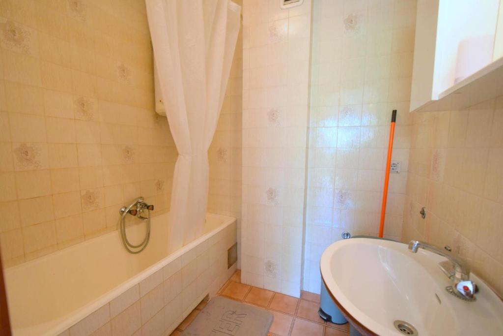 Łazienka w obiekcie Apartments Jadanec
