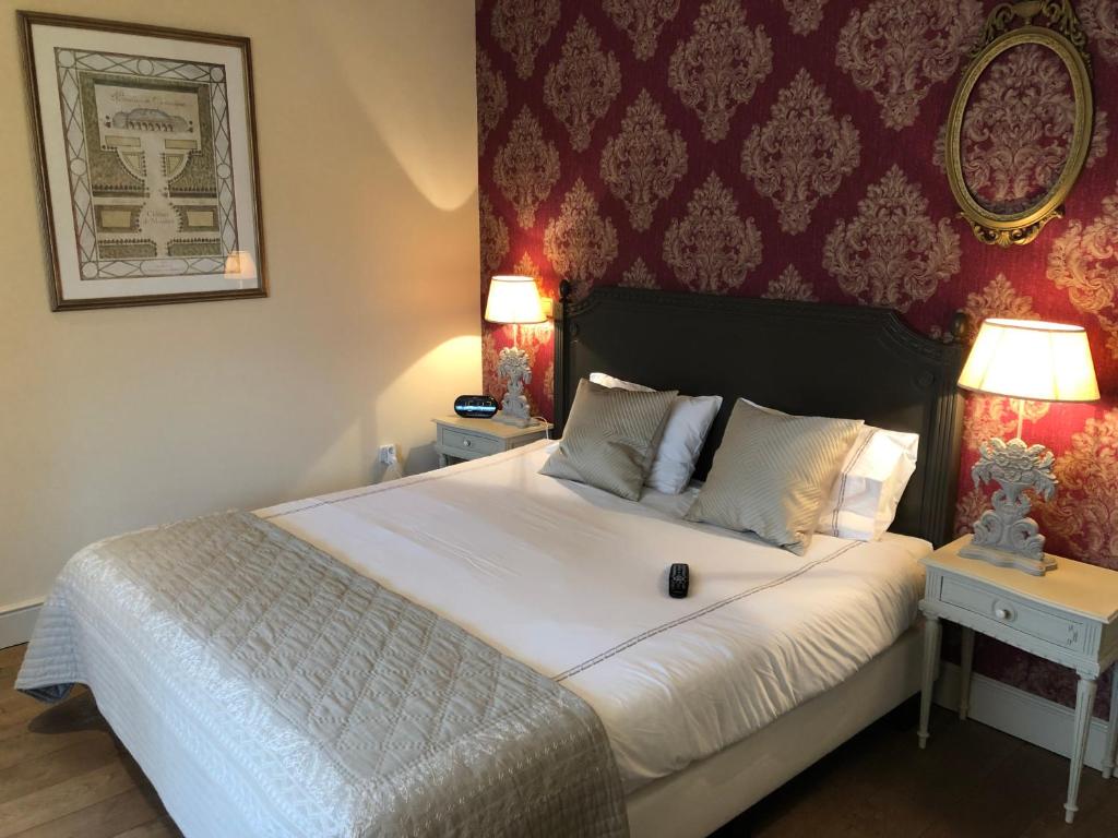 Postel nebo postele na pokoji v ubytování Bed & Breakfast Het Zilte Zand - luxe ontbijt - gratis parking - Westende Middelkerke