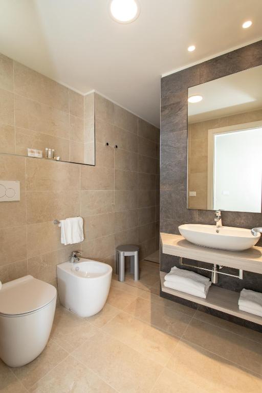 Koupelna v ubytování Hotel Ancora