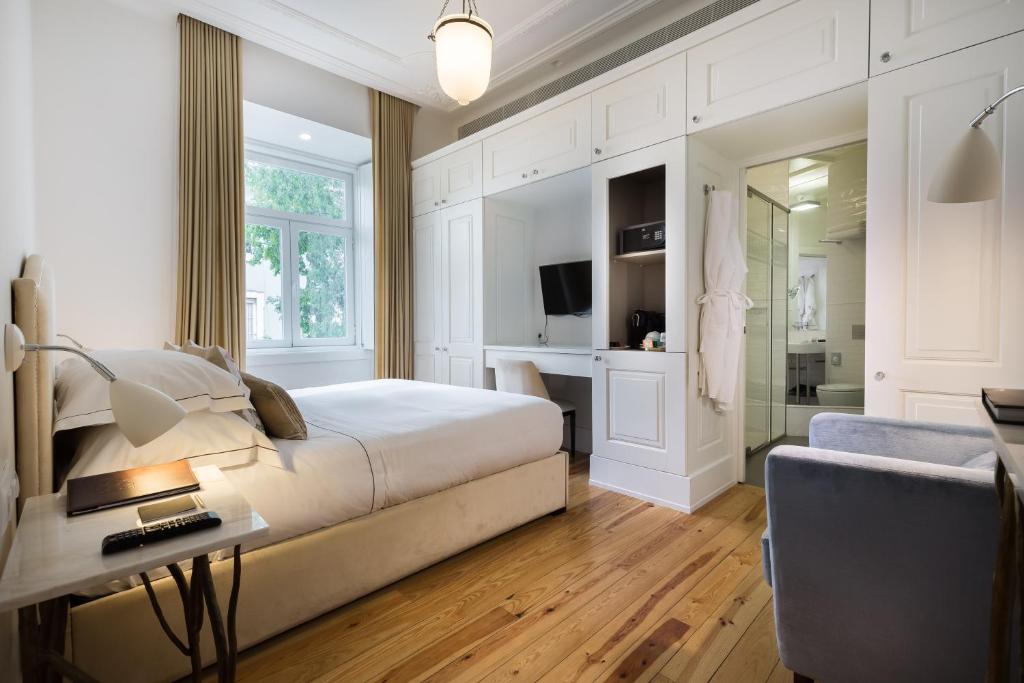 Postel nebo postele na pokoji v ubytování Santiago de Alfama - Boutique Hotel