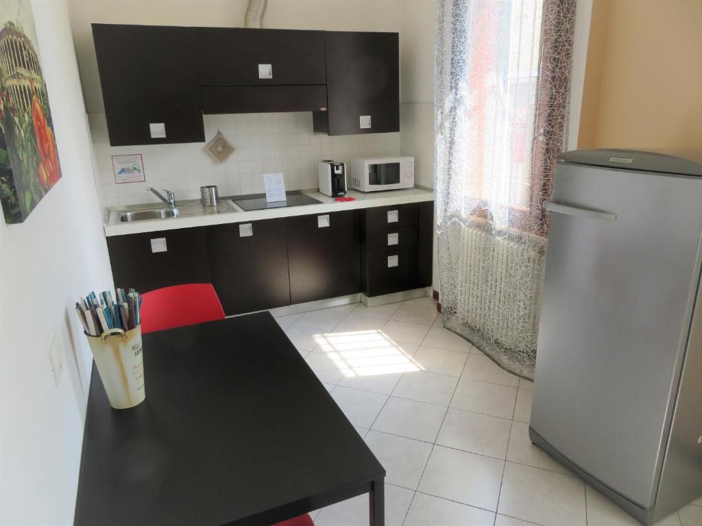 Kuchnia lub aneks kuchenny w obiekcie Verona Class ApartHotel "Residenze del Cuore"