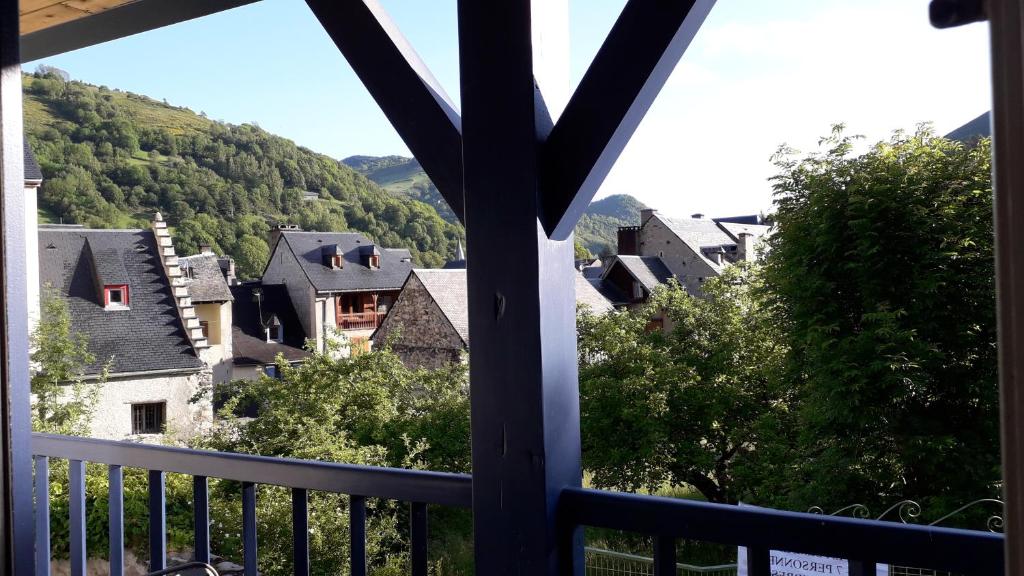 a view of a village from a balcony of a house at Le balcon face à l'Aspin in Arreau