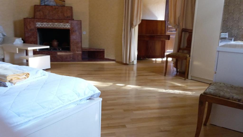 Postel nebo postele na pokoji v ubytování Guest House Keria