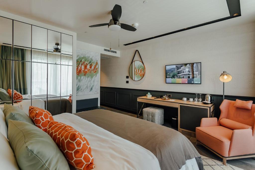 Letto o letti in una camera di Boutique Hotel & Spa Casa del Mare - Mediterraneo