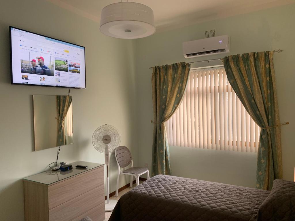 TV a/nebo společenská místnost v ubytování Cloud 9 Residence
