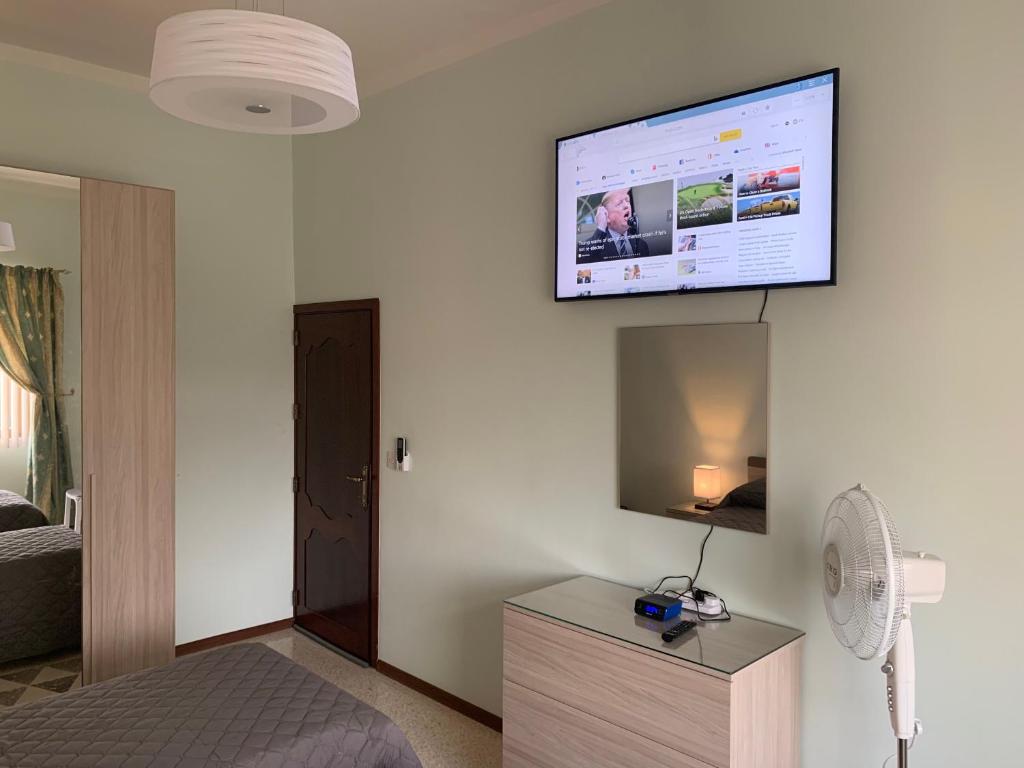 TV a/nebo společenská místnost v ubytování Cloud 9 Residence