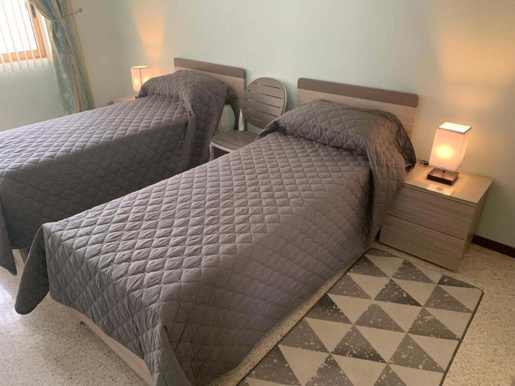 Postel nebo postele na pokoji v ubytování Cloud 9 Residence
