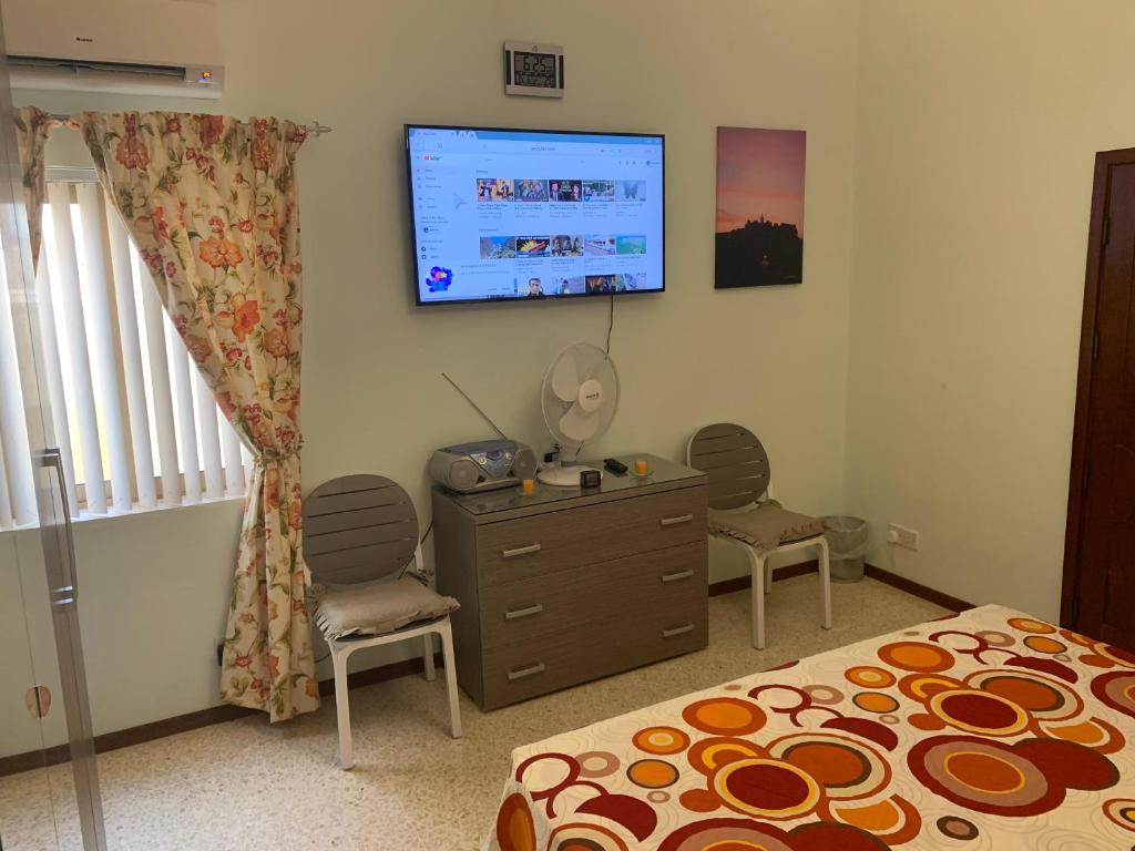 TV a/nebo společenská místnost v ubytování Cloud 9 Residence