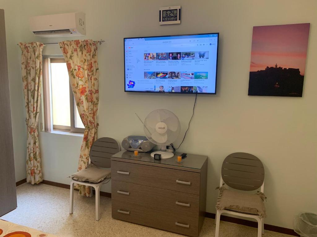 TV a/nebo společenská místnost v ubytování Cloud 9 Residence