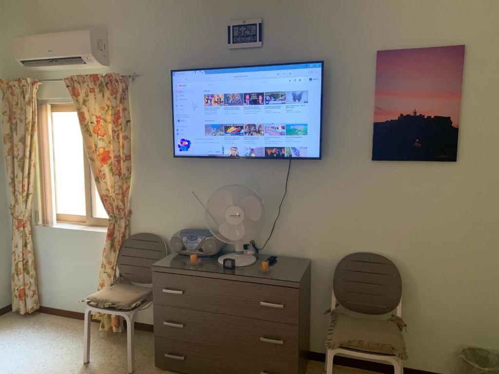 TV a/nebo společenská místnost v ubytování Cloud 9 Residence