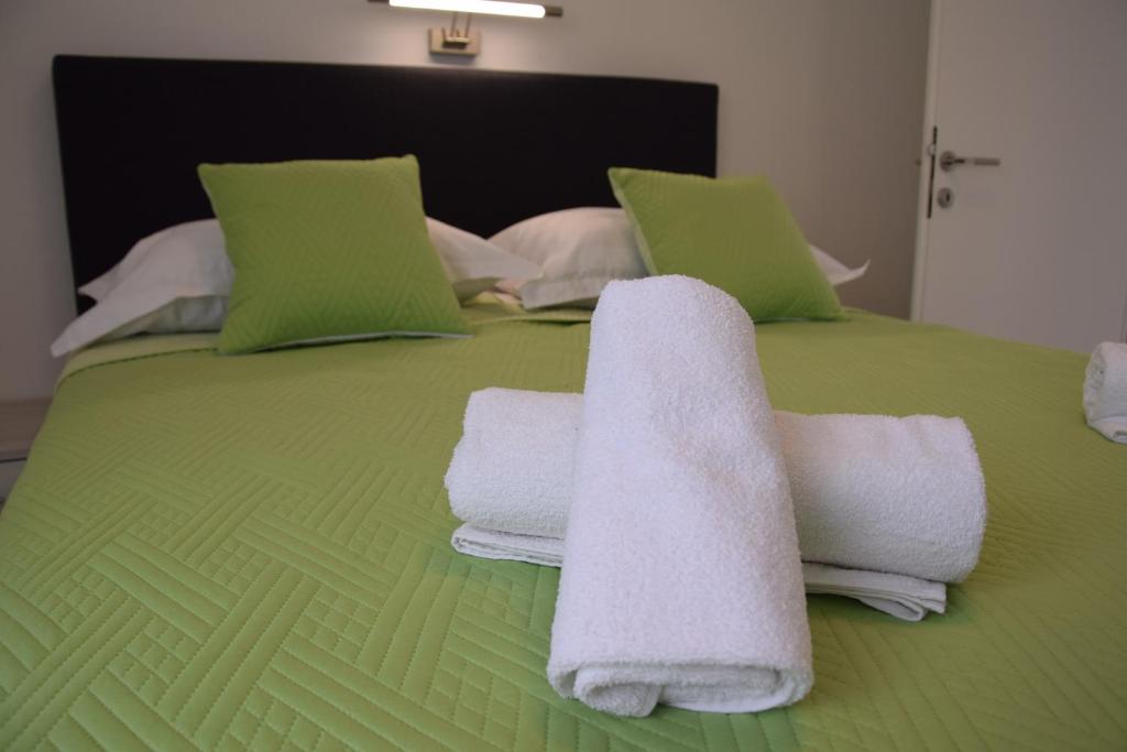 Posteľ alebo postele v izbe v ubytovaní Apartman Mili