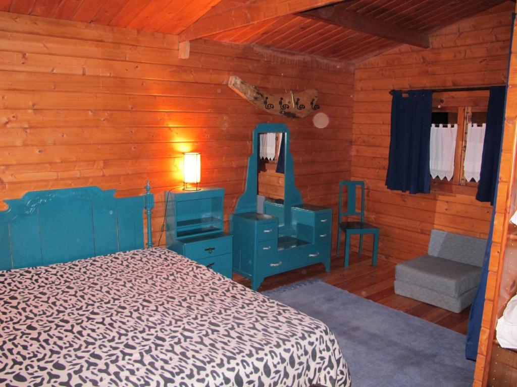 Postel nebo postele na pokoji v ubytování Parque de Campismo Rural Quinta das Laranjeiras
