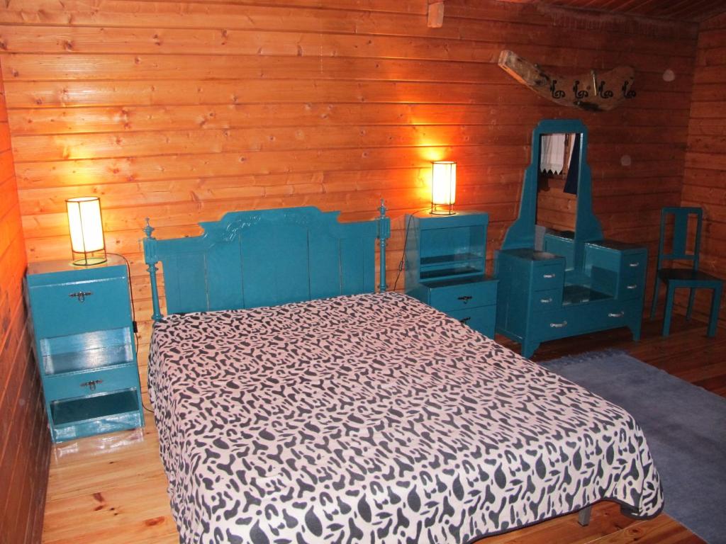 Postel nebo postele na pokoji v ubytování Parque de Campismo Rural Quinta das Laranjeiras