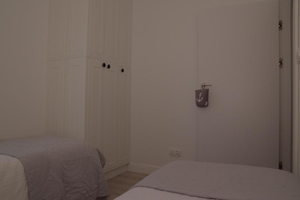 Postel nebo postele na pokoji v ubytování Kite Apart