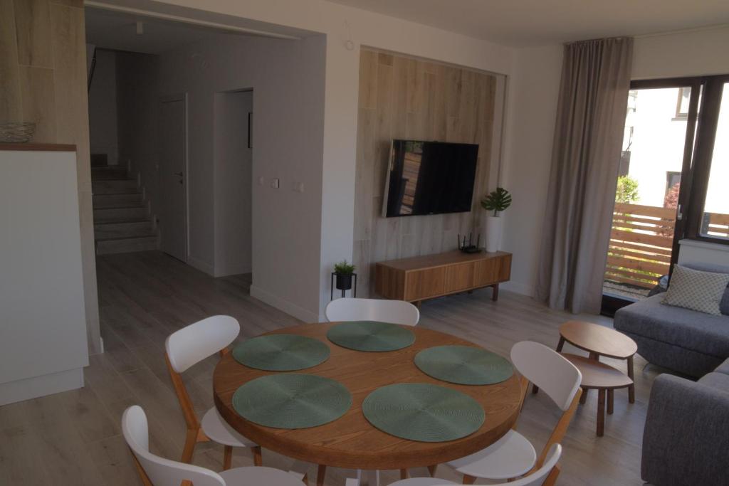TV a/nebo společenská místnost v ubytování Kite Apart